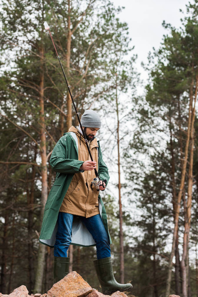 man with fishing rod - Fotografie, Obrázek