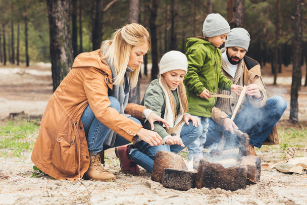 family making campfire - Photo, Image