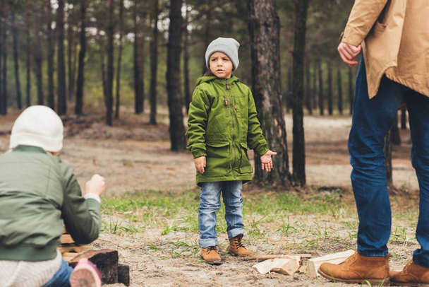 boy spending time on nature with family - 写真・画像
