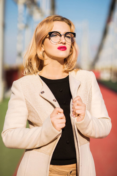 Closeup portrait of fashionable blonde model with bright makeup, - Fotó, kép
