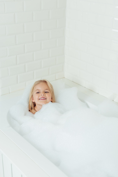 adorable child in bathtub - Fotó, kép
