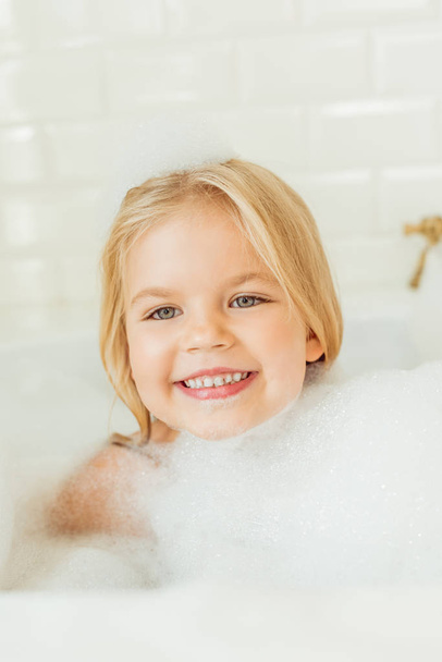 adorable child in bathtub - Fotó, kép