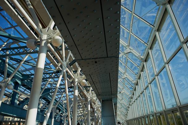 Glass dome with metal supports.The modern design of the bridge . - Φωτογραφία, εικόνα
