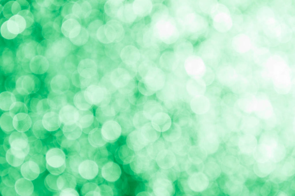 Green abstract background with blurry highlights - Foto, imagen