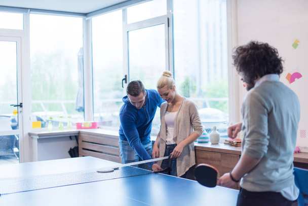startup business team playing ping pong tennis - Photo, image