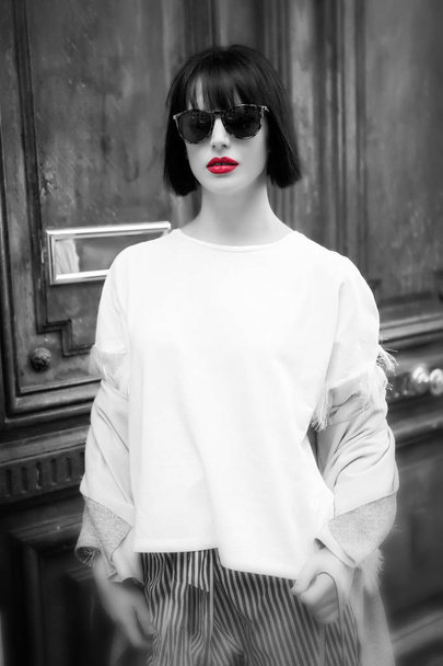lady with red lips with stylish hair in fashionable glasses - 写真・画像