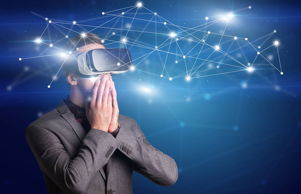 Businessman with virtual reality goggles - Zdjęcie, obraz