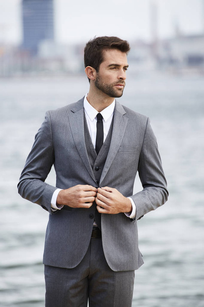 Serious businessman in grey suit - Foto, imagen