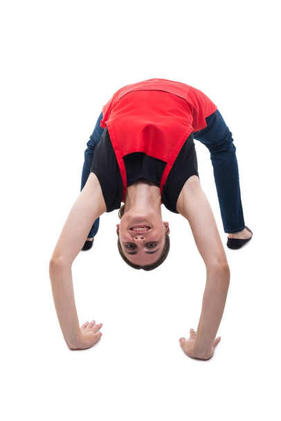 Flexible happy employee doing physical exercises - Foto, imagen