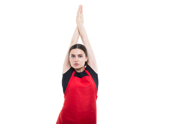 Όμορφο κορίτσι υπάλληλος τεντώνοντας τα χέρια της  - Φωτογραφία, εικόνα