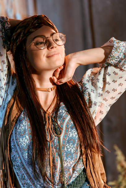 hippie girl stretching in house - Photo, Image