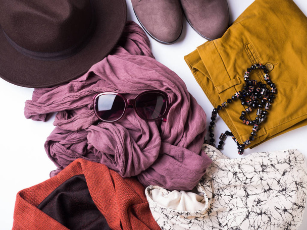 Flat lay with womans autumn clothes, glasses hat - Photo, Image