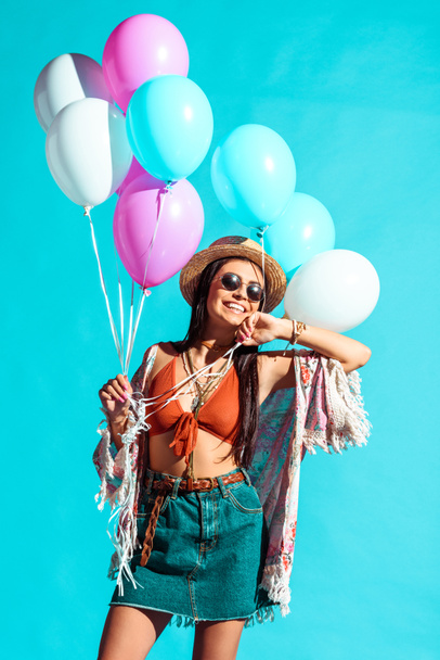 Hippie woman holding colored balloons  - Fotoğraf, Görsel