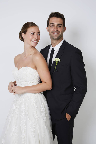 Well dressed couple smiling to camera  - Foto, imagen