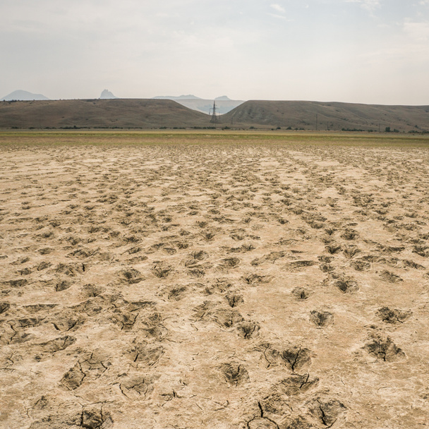 landscape with cracked earth - Fotó, kép