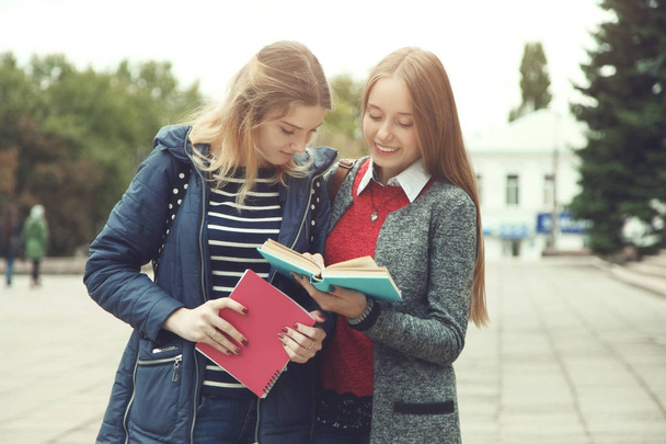  female students with books - Photo, Image