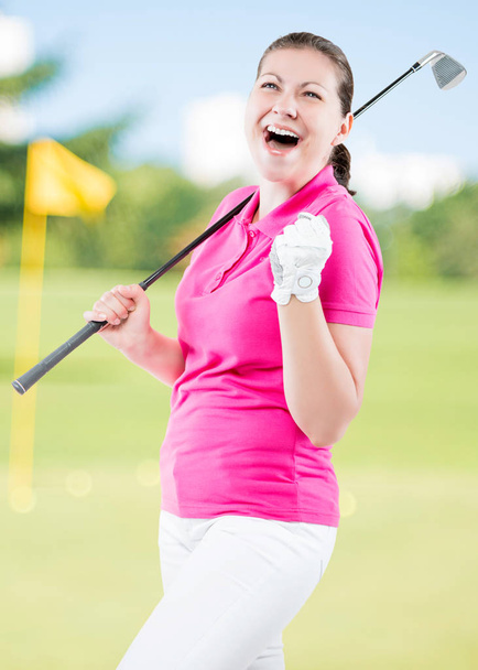 happy golfer jubilant on a background of golf courses with a gol - Zdjęcie, obraz