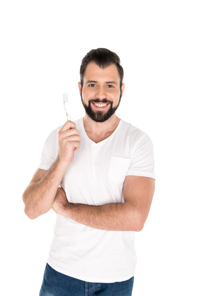 smiling man with toothbrush - Foto, afbeelding