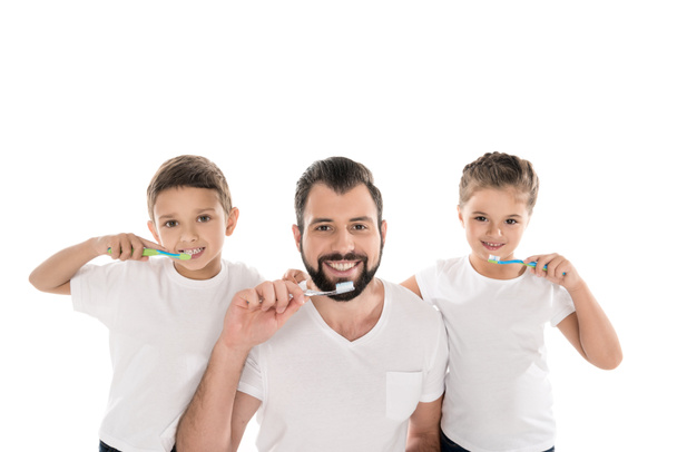 family brushing teeth - Foto, afbeelding