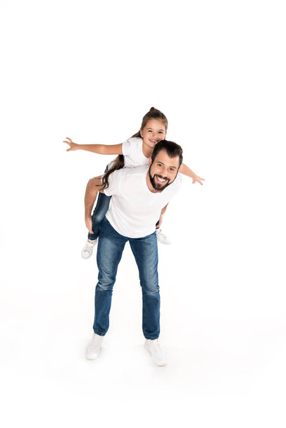 father and daughter piggybacking together - Photo, Image