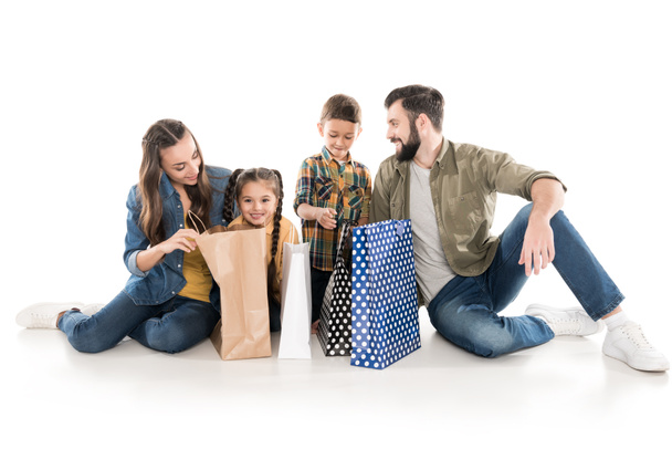 family with shopping bags - Фото, зображення