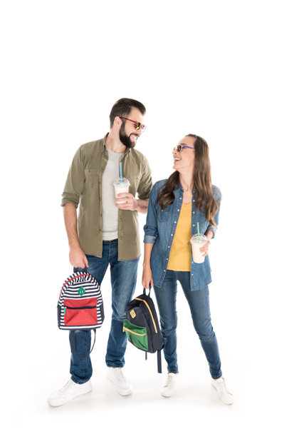 couple with backpacks and milkshakes - Valokuva, kuva