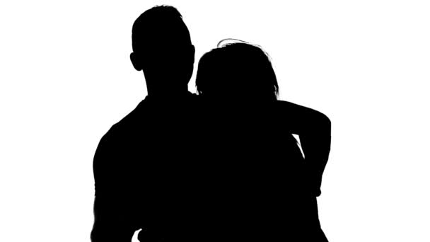 Silhouette of dancing man and woman - Video, Çekim