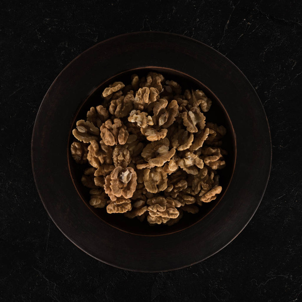 shelled walnuts in bowl - Photo, Image