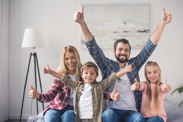 family showing thumbs up - Photo, Image