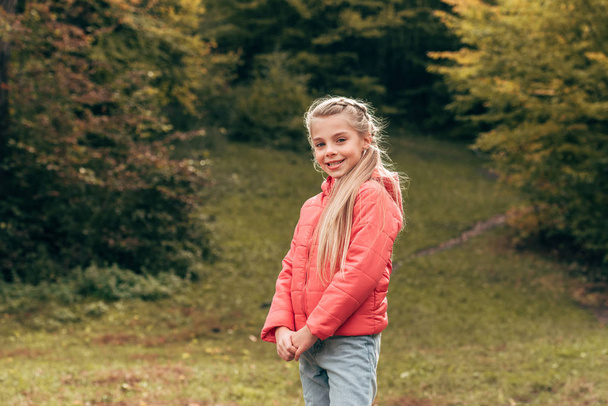 child in autumn park - Photo, Image