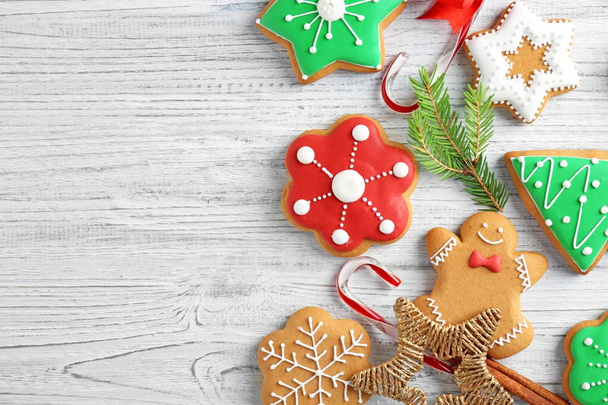 Creative Christmas cookies on wooden background - Fotografie, Obrázek