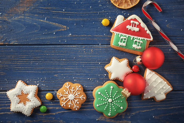 Frame made of creative Christmas cookies on wooden background - Foto, Imagem