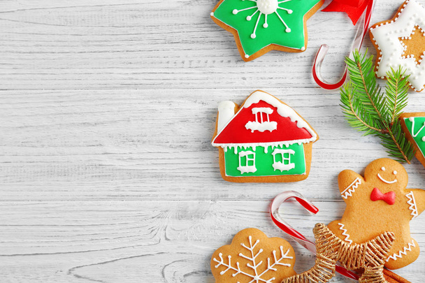 Creative Christmas cookies on wooden background - Fotoğraf, Görsel