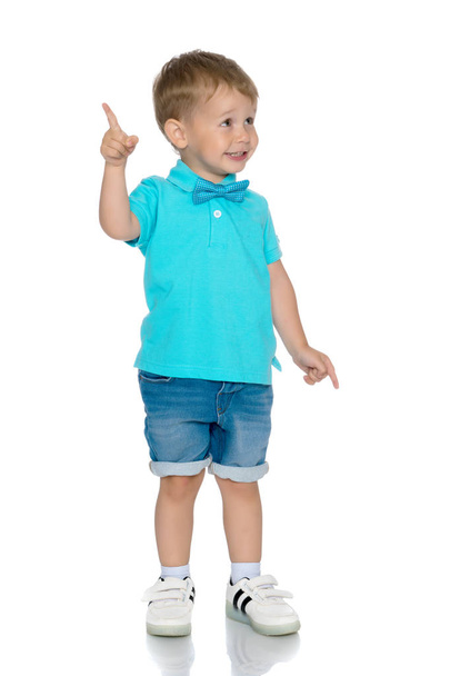 Little boy is showing a finger - Photo, image