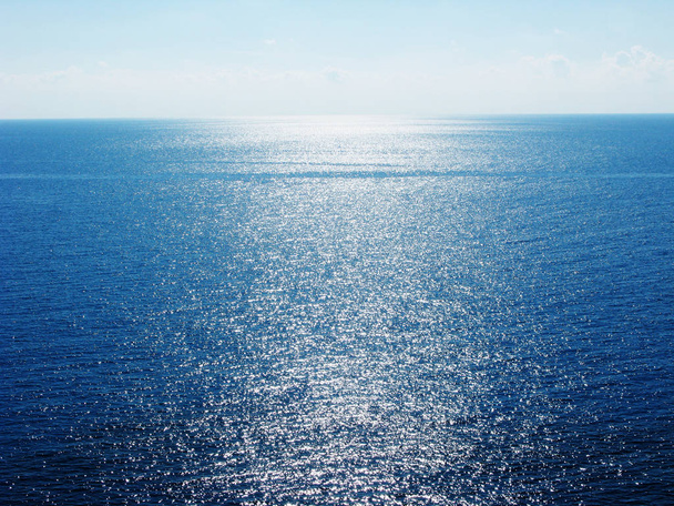 blue ionian sea view with sun beams on Corfu island  - Photo, Image