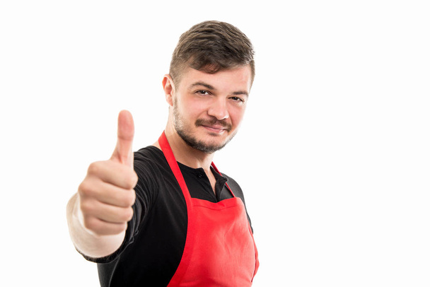 Příjemný mužský supermarketu zaměstnavatel zobrazeno jako gesto - Fotografie, Obrázek