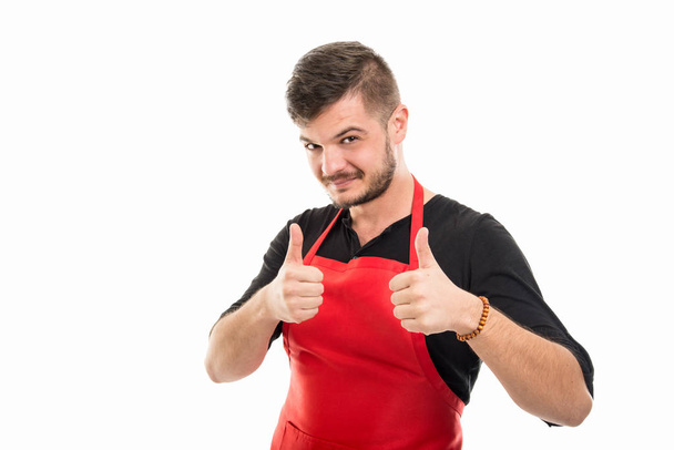 Friendly male supermarket employer showing double like gesture - Фото, зображення