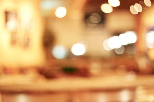 θολή φόντο πελατών στο εστιατόριο θάμπωμα του φόντου με bokeh - Φωτογραφία, εικόνα