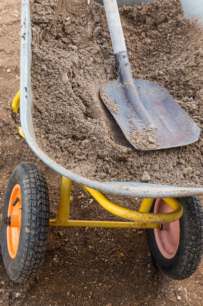 working trolley with sand and shovel - Photo, image
