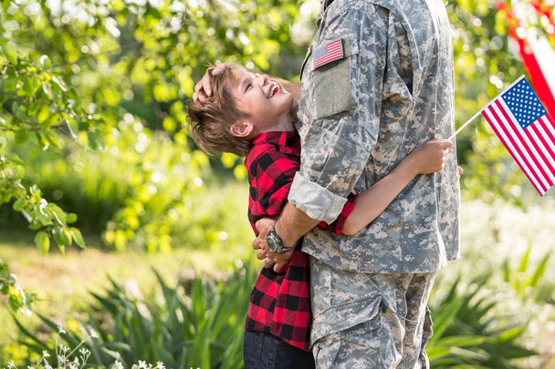 Happy reunion of soldier with family - 写真・画像