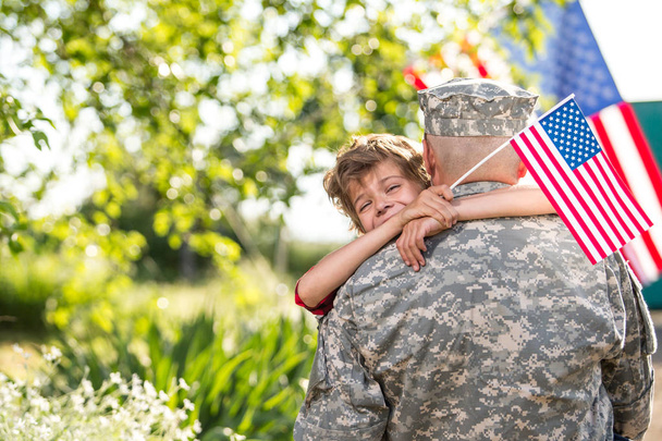 Happy reunion of soldier with family - Photo, Image