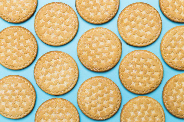 biscuits on a blue background, the rhythm - 写真・画像