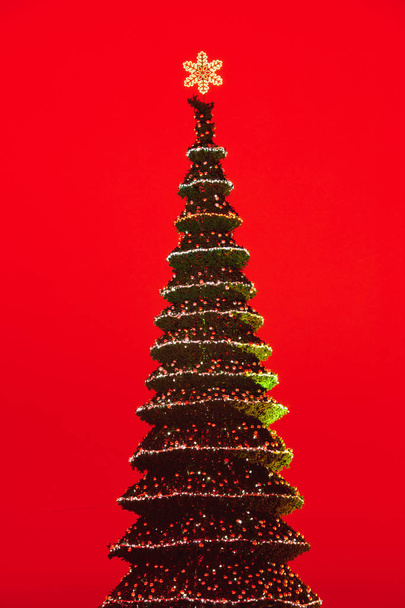 Christmas tree lights, red background - Photo, Image