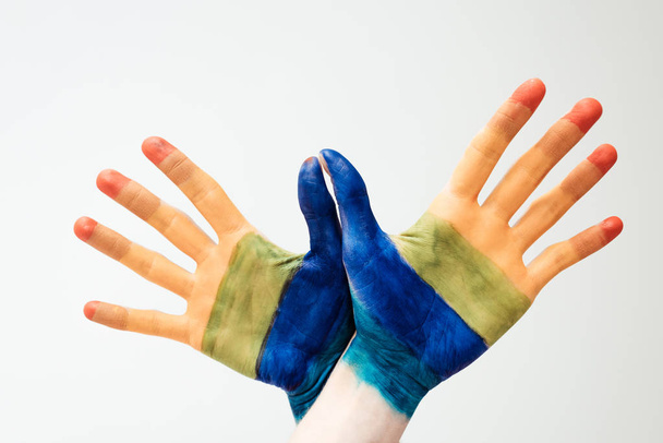 painted in rainbow hands - Photo, Image