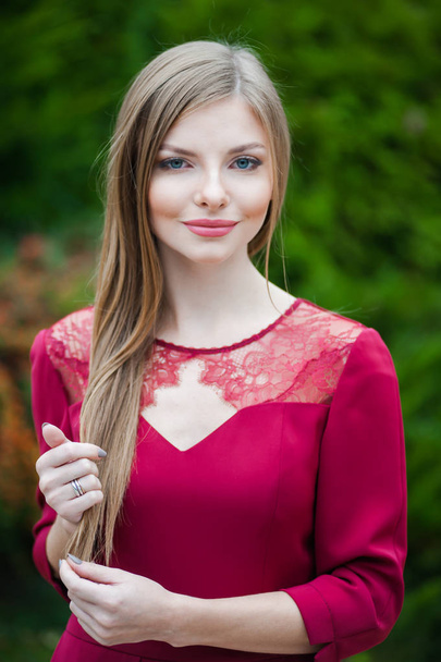 Beautiful girl in short red dress - Φωτογραφία, εικόνα
