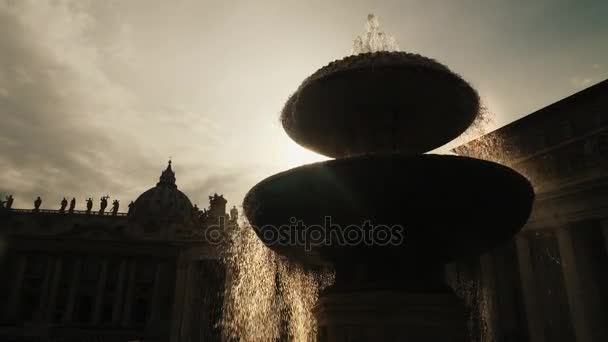 The famous Fountain of San Pietro Italian square with Saint Peter church columns, in Rome, Italy. - Felvétel, videó