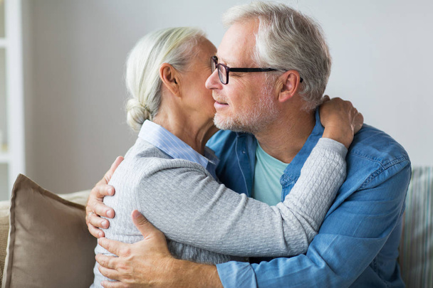 happy senior couple hugging at home - Fotoğraf, Görsel