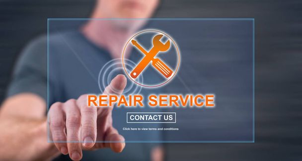 Man touching a repair service concept on a touch screen - Photo, Image