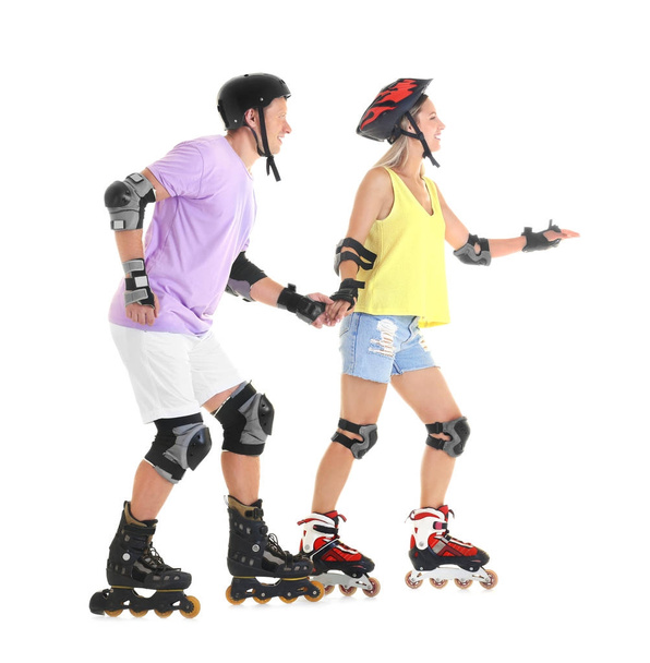 Couple sur patins à roulettes sur fond blanc
 - Photo, image
