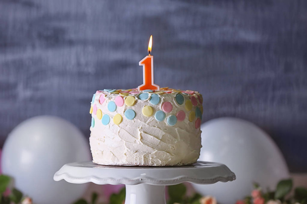 Cake with candle for first birthday  - Φωτογραφία, εικόνα